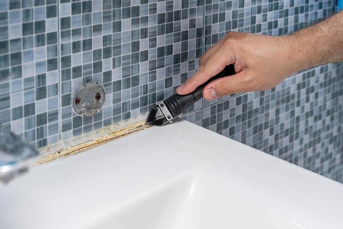 how to remove silicone from tiles