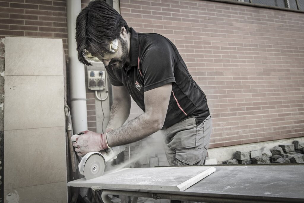 Professional using the ECD Grinding Blade.