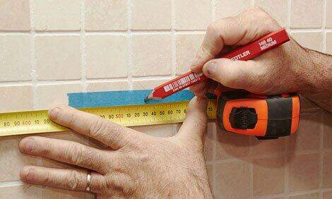 How to drill through tile. Step 3. Measuring 
